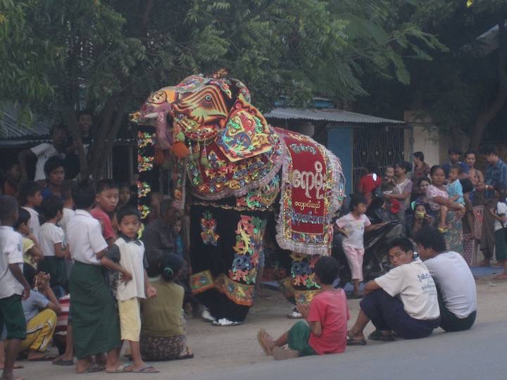 In Thazi an elephant danced and showed off all along the street to try and attract donations for a pagoda repair.